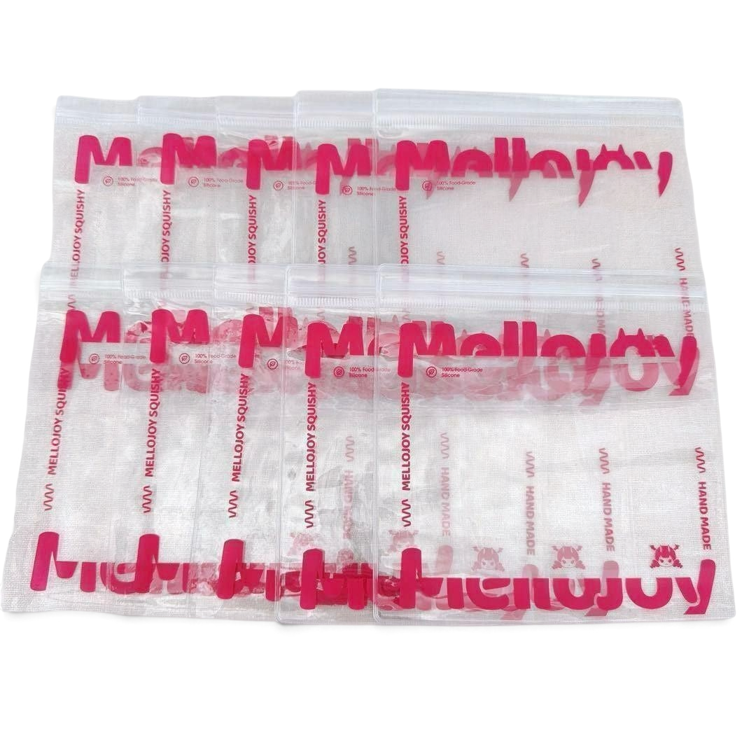メロジョイ 予備袋。MellojoyロゴとHAND MADEの赤いプリント入り、透明ジッパー付きPVC袋（スクイーズ用替え袋）