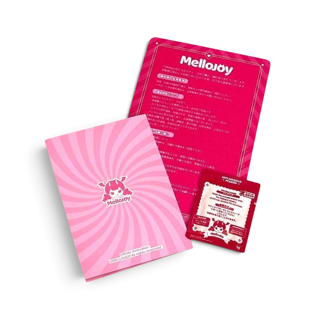 メロジョイ（Mellojoy）スクイーズ用メンテナンスパウダーセット。ピンクのパッケージと説明書、マジックシュガーパウダーの小袋がセットになったお手入れ用品