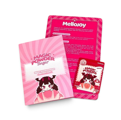 メロジョイ（Mellojoy）スクイーズ用マジックシュガーパウダー。可愛いキャラクターが描かれたピンクのメンテナンスパウダーと説明書セット
