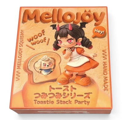 マイストアのメロジョイ トーストつみつみシリーズのブラインドボックス。デビル風の女の子とトーストに入った子犬のイラストが描かれたオレンジ色のパッケージ。